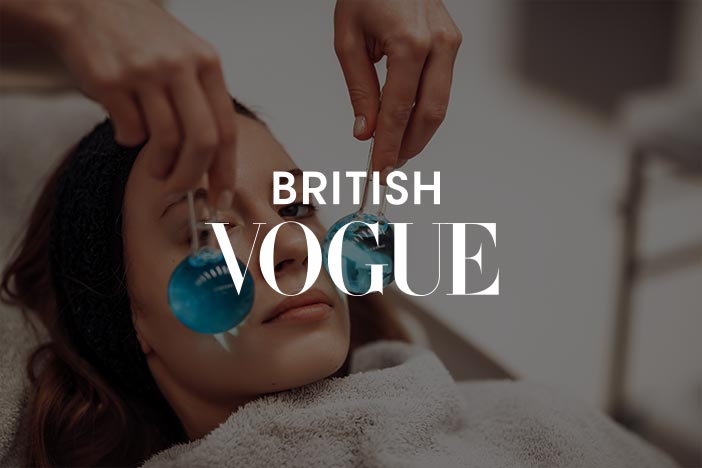 Close-up of a relaxed face with gentle under-eye care, featured in British Vogue article about reducing puffy eyes